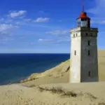 Hvor kan man parkere ved Rubjerg Knude Fyr til solnedgang?